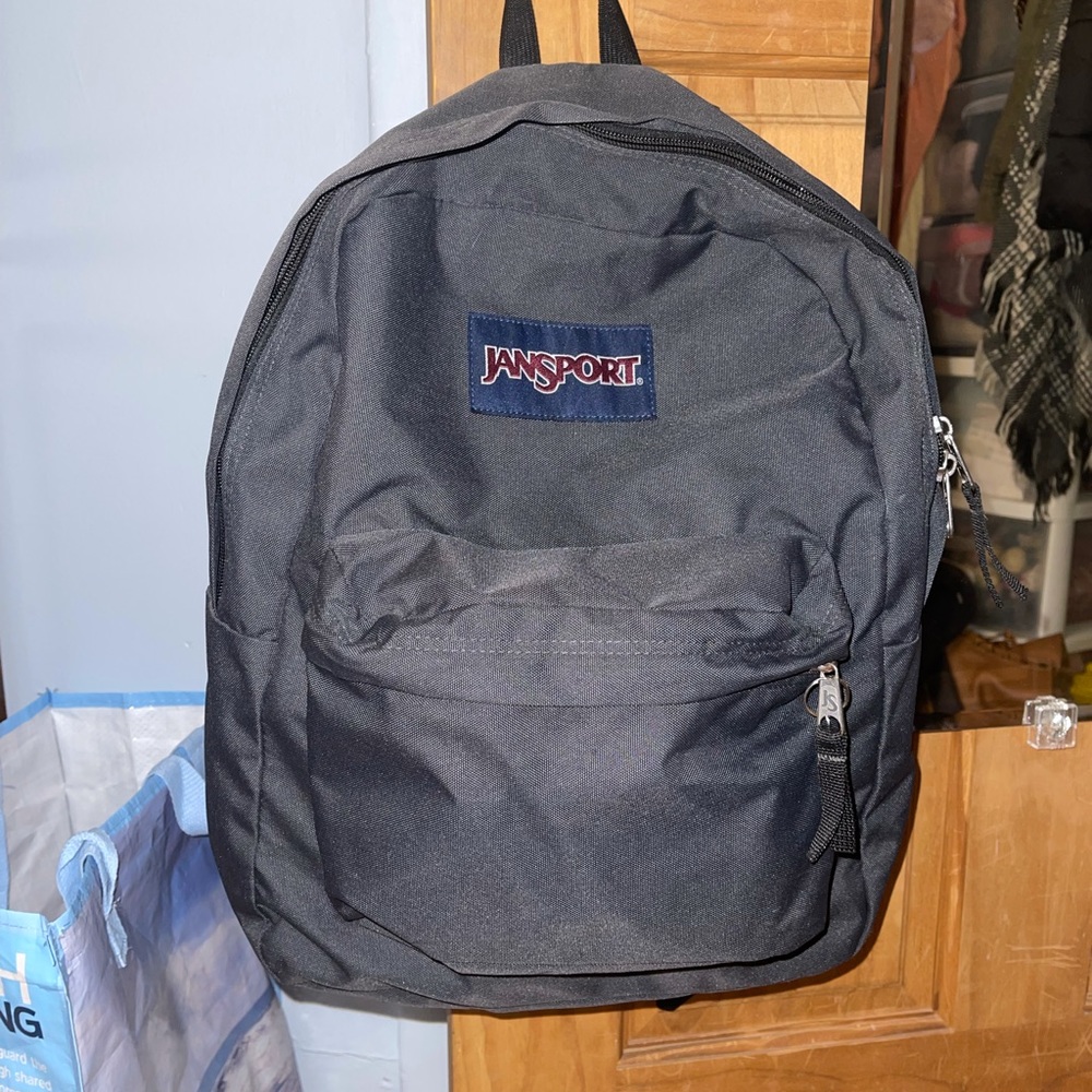 Jansport- single large pocket backpack
